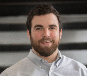 Portrait of Michael Abramowitz, Founder and Managing Partner of Masswell Capital Advisors, smiling in a professional setting